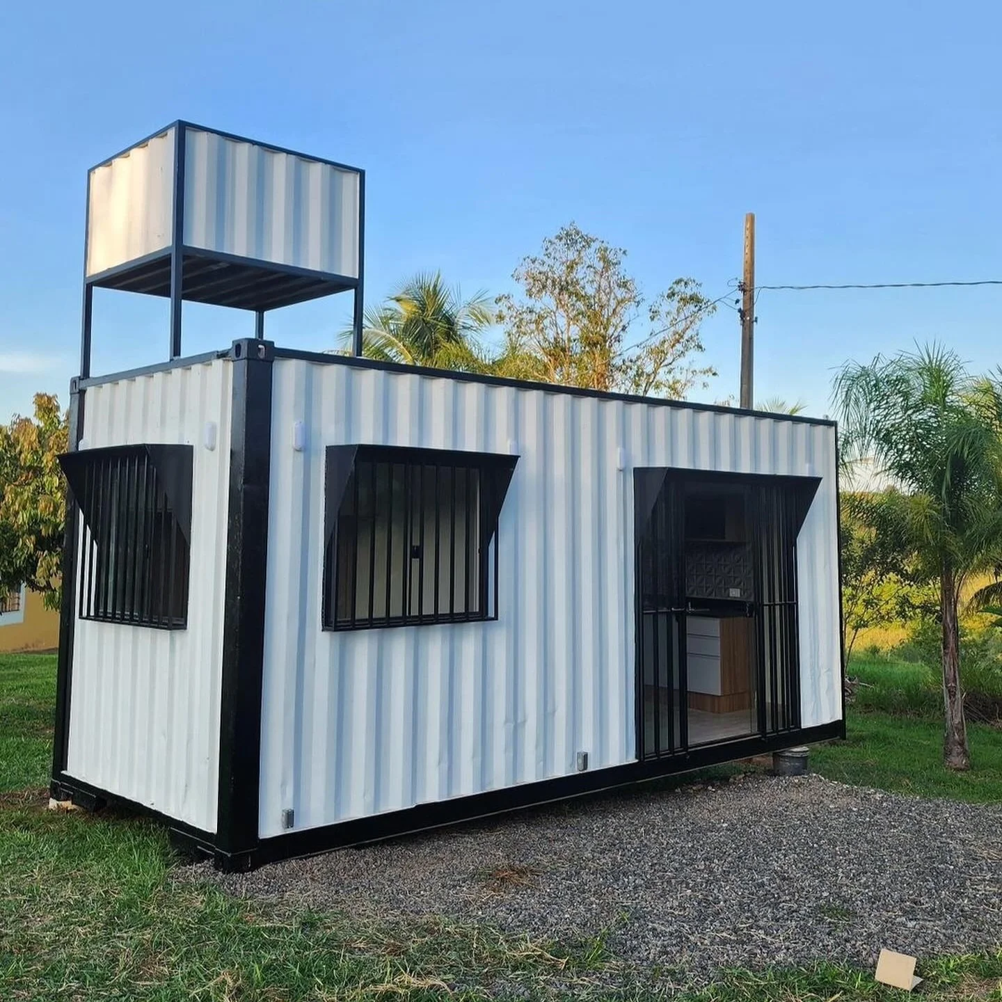 Custom 20ft Shipping Container Home With Water Tank - M-W Containers