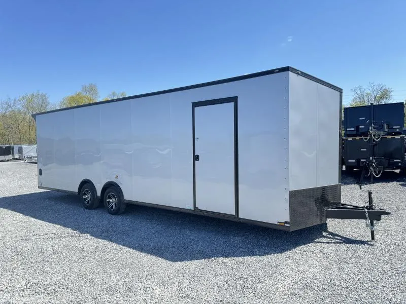 Transport your vehicles in style and with premium features with this NEW 2024 Cargo Mate 8.5×28′ Enclosed Car Hauler in a sleek silver finish, enhanced with the popular Blackout Package and a 7’4″ UTV Package. This trailer boasts aluminum wheels, a rear spoiler, a spread axle, stabilizer jacks, and much more!